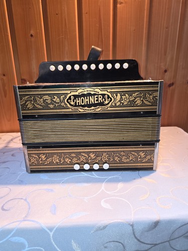 Old hohner hand harmonica - hand,